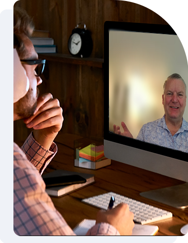 Professional business coach conducting one-on-one coaching session with entrepreneur