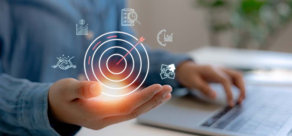 Business team executing go-to-market strategy with charts and planning documents